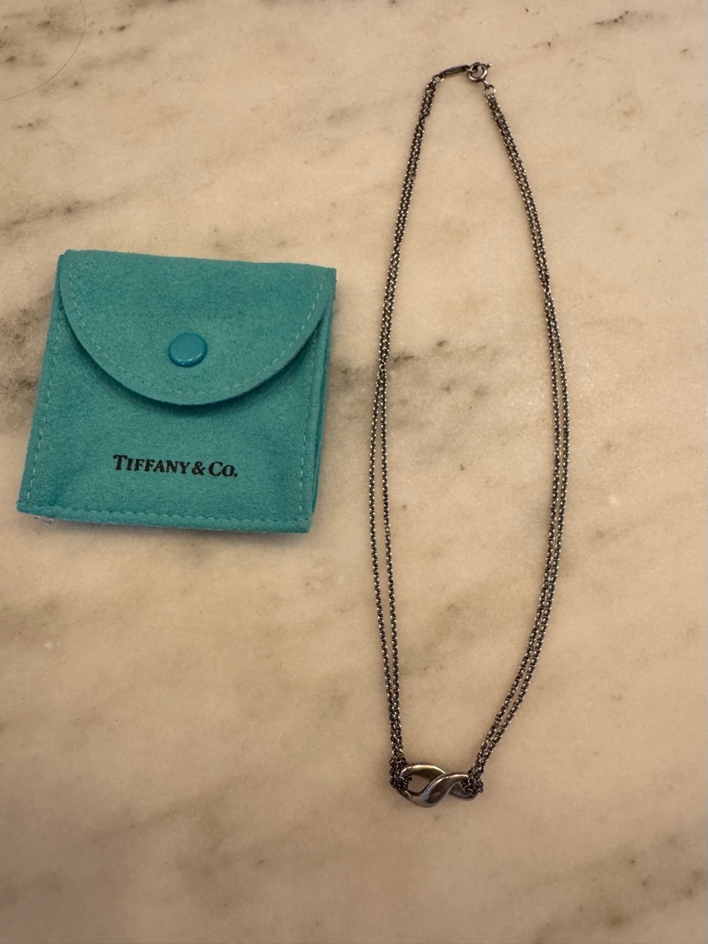 Tiffany & Co. Silver Infinity Knot Necklace with Pouch